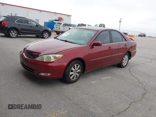 2003 Toyota Camry LE with VIN 4T1BE30K03U227243, listed as a IAAI auction lot 42063924 with 177,323 mi miles and . Bid and sale history available at DreamBid. Image 2.