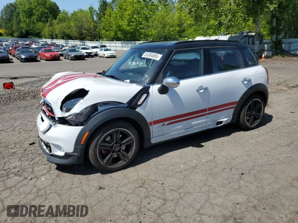 2015 MINI Countryman John Cooper Works with VIN WMWXD1C58FWS34860, listed as a Copart auction lot 55384065 with 48,709 mi miles and Salvage Title. Bid and sale history available at DreamBid. Image 1.