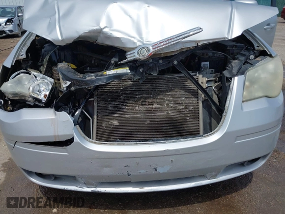 2008 Chrysler Town & Country Touring with VIN 2A8HR54P88R671360, listed as a IAAI auction lot 42104217 with 212,828 mi miles and . Bid and sale history available at DreamBid. Image 6.