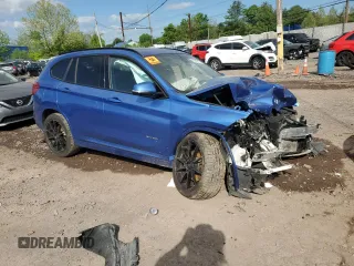 2017 BMW X1 xDrive28i with VIN WBXHT3C32H5F81460, listed as a Copart auction lot 55998515 with 123,853 mi miles and Salvage title. Bid and sale history available at DreamBid. Image 4.