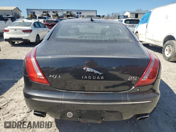 2013 Jaguar XJ Portfolio with VIN SAJWJ2GDXD8V45921, listed as a Copart auction lot 49289825 with 115,152 mi miles and Salvage title. Bid and sale history available at DreamBid. Image 6.