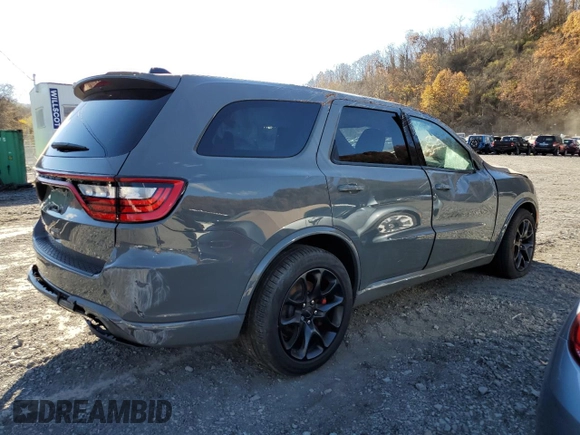 2023 Dodge Durango SRT Hellcat Premium z VIN 1C4SDJH92PC695631, wystawiony jako Copart lot #79218334 z przebiegiem Nie podano mil oraz Szkoda całkowita • Salvage title. Historia ofert i sprzedaży dostępna na DreamBid. Obrazek 3.