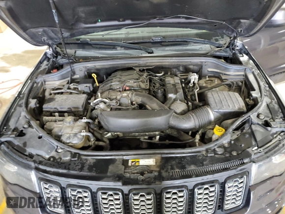 2018 Jeep Grand Cherokee Altitude z VIN 1C4RJFAG8JC119286, wystawiony jako Copart lot #62096725 z przebiegiem 134 332 mil mil oraz Szkoda całkowita • Salvage title. Historia ofert i sprzedaży dostępna na DreamBid. Obrazek 12.