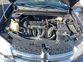 2013 Dodge Avenger SE with VIN 1C3CDZAB1DN544719, listed as a IAAI auction lot 41732090 with 205,536 mi miles and . Bid and sale history available at DreamBid. Image 10.