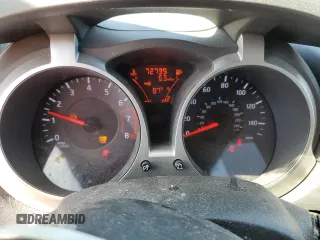 2013 Nissan Juke SV z VIN JN8AF5MR8DT212176, wystawiony jako Copart lot #53078745 z przebiegiem 72 799 mil mil oraz Szkoda całkowita • Salvage title. Historia ofert i sprzedaży dostępna na DreamBid. Obrazek 9.