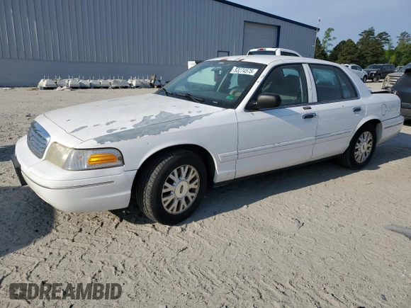2003 Ford Crown Victoria LX z VIN 2FAFP74W03X209148, wystawiony jako Copart lot #53274575 z przebiegiem 127 739 mil mil oraz Szkody całkowita. Historia ofert i sprzedaży dostępna na DreamBid. Obrazek 1.