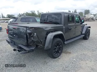 2021 Jeep Gladiator High Altitude with VIN 1C6HJTFG8ML567087, listed as a IAAI auction lot 42549990 with 30,437 mi miles and . Bid and sale history available at DreamBid. Image 4.