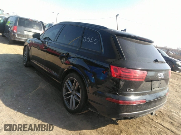 2017 Audi Q7 Prestige with VIN WA1VAAF78HD026650, listed as a IAAI auction lot 41841616 with 105,396 mi miles and . Bid and sale history available at DreamBid. Image 3.