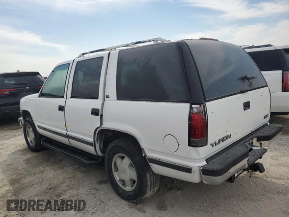 1998 GMC Yukon with VIN 1GKEK13R9WJ711087, listed as a Copart auction lot 73795594 with 177,708 mi miles and Non Repairable. Bid and sale history available at carsss.com. Image 2.