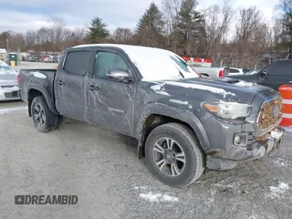 2019 Toyota Tacoma SR with VIN 3TMCZ5AN7KM284592, listed as a IAAI auction lot 41632856 with Not provided miles and . Bid and sale history available at DreamBid. Image 1.