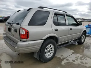 2004 Isuzu Rodeo S with VIN 4S2CK58W344311048, listed as a Copart auction lot 45154765 with 128,733 mi miles and Clean Title. Bid and sale history available at DreamBid. Image 3.