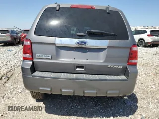2012 Ford Escape Limited z VIN 1FMCU0E7XCKB19962, wystawiony jako Copart lot #49287765 z przebiegiem 132 747 mil mil oraz Szkoda całkowita • Salvage title. Historia ofert i sprzedaży dostępna na DreamBid. Obrazek 6.
