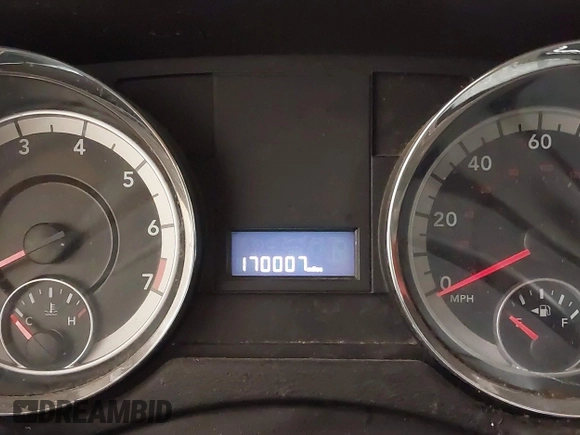 2013 Dodge Grand Caravan SXT with VIN 2C4RDGCG9DR669053, listed as a IAAI auction lot 41626033 with 170,007 mi miles and . Bid and sale history available at DreamBid. Image 7.