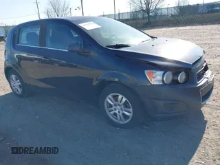 2014 Chevrolet Sonic LT with VIN 1G1JC6SGXE4132765, listed as a IAAI auction lot 41747782 with 144,485 mi miles. Bid and sale history available at carsss.com. Image 1.