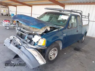 2001 Ford F-150 XL with VIN 1FTZX17281KF04799, listed as a IAAI auction lot 42550320 with Not provided miles and . Bid and sale history available at DreamBid. Image 2.