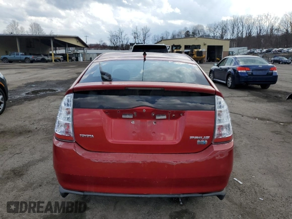 2007 Toyota Prius z VIN JTDKB20U673208958, wystawiony jako Copart lot #50962815 z przebiegiem Nie podano mil oraz Czysty tytuł • Clean title. Historia ofert i sprzedaży dostępna na DreamBid. Obrazek 6.