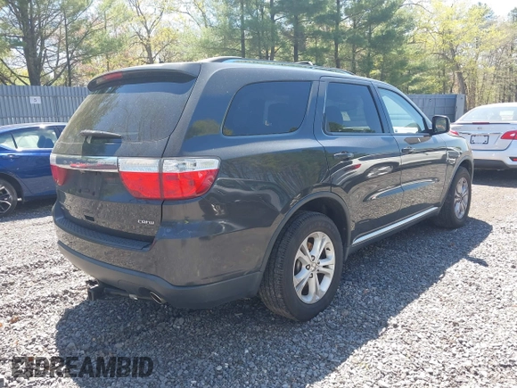 2011 Dodge Durango Crew with VIN 1D4SE4GT6BC664597, listed as a IAAI auction lot 42142568 with 202,275 mi miles and . Bid and sale history available at carsss.com. Image 4.
