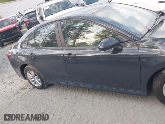 2025 Toyota Camry LE with VIN 4T1DAACKXSU541257, listed as a IAAI auction lot 42052246 with 13,585 mi miles and . Bid and sale history available at DreamBid. Image 13.
