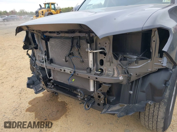 2022 Toyota Tacoma SR with VIN 3TYCZ5AN3NT078324, listed as a IAAI auction lot 42007132 with 35,802 mi miles and . Bid and sale history available at DreamBid. Image 6.