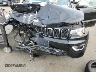 2018 Jeep Grand Cherokee Limited with VIN 1C4RJFBG6JC459213, listed as a Copart auction lot 87079644 with 134,848 mi miles and Salvage title. Bid and sale history available at DreamBid. Image 11.