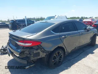 2018 Ford Fusion SE with VIN 3FA6P0HD6JR255644, listed as a IAAI auction lot 42021447 with 122,022 mi miles. Bid and sale history available at carsss.com. Image 4.
