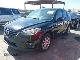 2016 Mazda CX-5 Touring z VIN JM3KE4CY2G0656270, wystawiony jako IAAI lot #42344489 z przebiegiem 60 449 mil mil oraz . Historia ofert i sprzedaży dostępna na DreamBid. Obrazek 19.