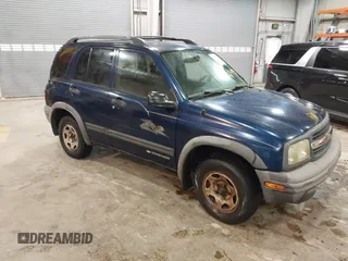 2003 Chevrolet Tracker ZR2 z VIN 2CNBJ734736905310, wystawiony jako IAAI lot #41519431 z przebiegiem 177 643 mil mil oraz . Historia ofert i sprzedaży dostępna na DreamBid. Obrazek 1.