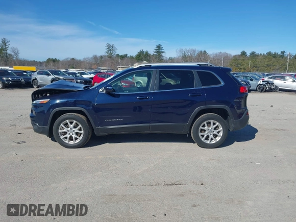 2015 Jeep Cherokee Latitude with VIN 1C4PJMCB3FW652553, listed as a IAAI auction lot 41881238 with 161,944 mi miles and . Bid and sale history available at DreamBid. Image 14.