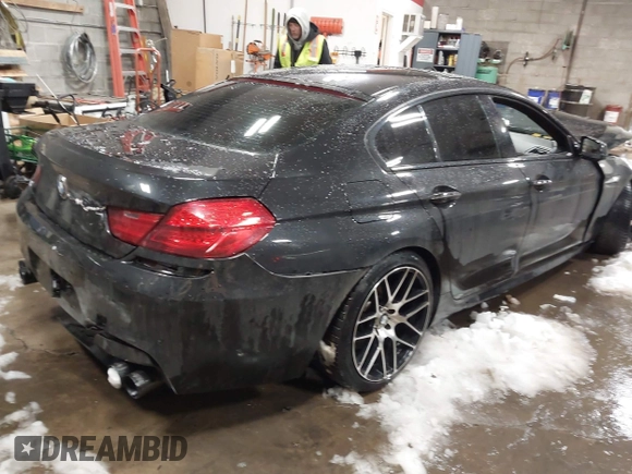 2014 BMW 6 Series 650i xDrive with VIN WBA6B4C56ED760482, listed as a IAAI auction lot 41384990 with 64,863 mi miles. Bid and sale history available at carsss.com. Image 4.