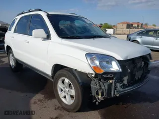 2009 Kia Sportage LX with VIN KNDJF723197622517, listed as a IAAI auction lot 41771268 with 127,112 mi miles. Bid and sale history available at carsss.com. Image 1.