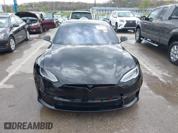 2022 Tesla Model S Plaid with VIN 5YJSA1E60NF460244, listed as a IAAI auction lot 41996403 with Not provided miles and . Bid and sale history available at DreamBid. Image 12.