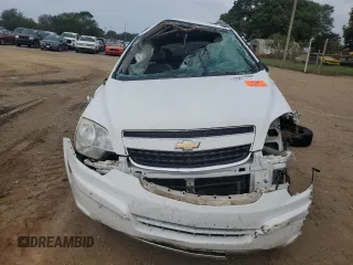 2012 Chevrolet Captiva Sport LTZ with VIN 3GNFL4E57CS638280, listed as a Copart auction lot 73817564 with Not Provided miles and Salvage Title. Bid and sale history available at DreamBid. Image 5.