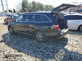 2011 Honda Odyssey EX-L with VIN 5FNRL5H69BB080861, listed as a Copart auction lot 53690005 with 206,646 mi miles and Salvage Title. Bid and sale history available at DreamBid. Image 2.