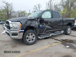 2023 Ram 2500 Big Horn with VIN 3C6UR5DL8PG611061, listed as a IAAI auction lot 41911153 with 49,055 mi miles. Bid and sale history available at carsss.com. Image 2.