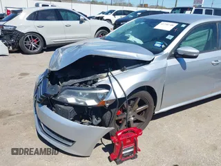 2015 Volkswagen Passat 1.8T Limited Edition with VIN 1VWAT7A30FC014689, listed as a IAAI auction lot 41758748 with 140,545 mi miles. Bid and sale history available at carsss.com. Image 6.