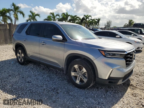 2024 Honda Pilot EX-L 7 Passenger with VIN 5FNYG2H50RB007894, listed as a Copart auction lot 59764574 with 3,801 mi miles and Non Repairable. Bid and sale history available at carsss.com. Image 4.