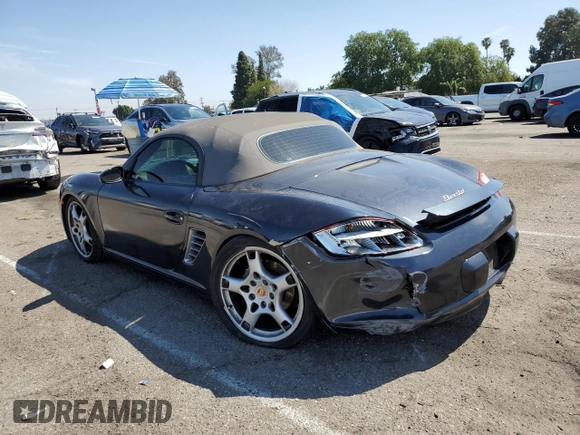 2006 Porsche Boxster z VIN WP0CA29876U712814, wystawiony jako Copart lot #49630945 z przebiegiem 66 044 mil mil oraz Szkoda całkowita • Salvage title. Historia ofert i sprzedaży dostępna na DreamBid. Obrazek 2.
