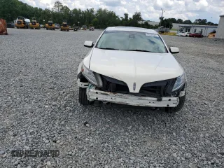 2013 Lincoln MKS with VIN 1LNHL9DK2DG604085, listed as a Copart auction lot 60325385 with 172,808 mi miles and Salvage title. Bid and sale history available at DreamBid. Image 5.