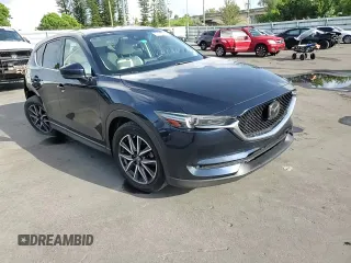2018 Mazda CX-5 Grand Touring with VIN JM3KFADMXJ1353942, listed as a Copart auction lot 60570835 with 74,400 mi miles and Clean title. Bid and sale history available at DreamBid. Image 14.