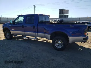2003 Ford F-350 XL with VIN 1FTWW33P43EB78603, listed as a Copart auction lot 76317284 with 228,798 mi miles and Salvage Title. Bid and sale history available at DreamBid. Image 2.