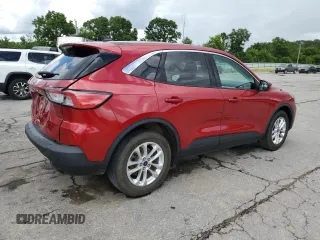 2021 Ford Escape SE with VIN 1FMCU0G67MUA28996, listed as a Copart auction lot 60305015 with 64,013 mi miles and Salvage title. Bid and sale history available at DreamBid. Image 3.