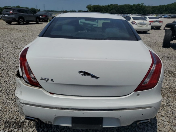 2011 Jaguar XJ XJL with VIN SAJWA2GB6BLV14612, listed as a Copart auction lot 63660355 with 93,763 mi miles and Salvage title. Bid and sale history available at DreamBid. Image 6.