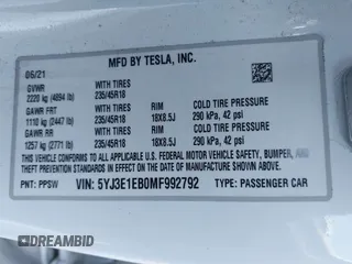 2021 Tesla Model 3 Long Range with VIN 5YJ3E1EB0MF992792, listed as a IAAI auction lot 41726740 with 33,507 mi miles. Bid and sale history available at carsss.com. Image 9.