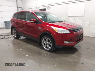 2013 Ford Escape SEL z VIN 1FMCU9HX5DUC06738, wystawiony jako IAAI lot #42404536 z przebiegiem 140 615 mil mil oraz . Historia ofert i sprzedaży dostępna na DreamBid. Obrazek 1.