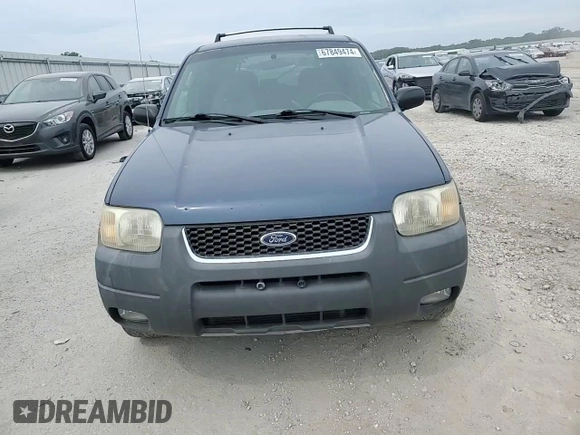 2001 Ford Escape XLT with VIN 1FMYU03131KF10968, listed as a Copart auction lot 67849474 with 197,328 mi miles and Salvage Title. Bid and sale history available at carsss.com. Image 11.