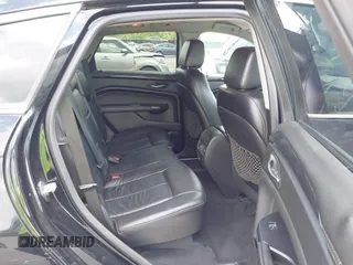 2014 Cadillac SRX with VIN 3GYFNAE30ES641616, listed as a IAAI auction lot 42000120 with 145,000 mi miles and . Bid and sale history available at DreamBid. Image 8.