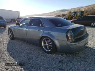 2007 Chrysler 300 C with VIN 2C3LA63H67H706530, listed as a Copart auction lot 88174615 with 104,505 mi miles and Salvage Title. Bid and sale history available at carsss.com. Image 2.
