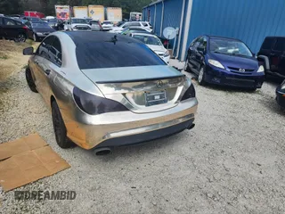 2014 Mercedes-Benz CLA 250 z VIN WDDSJ4EB8EN105859, wystawiony jako IAAI lot #41768079 z przebiegiem 128 020 mil mil oraz . Historia ofert i sprzedaży dostępna na DreamBid. Obrazek 3.
