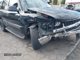 2005 Chevrolet Tahoe Z71 with VIN 1GNEC13TX5R145310, listed as a IAAI auction lot 42056793 with 159,002 mi miles and . Bid and sale history available at DreamBid. Image 6.