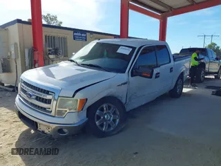2014 Ford F-150 XL with VIN 1FTFW1CT5EKG08435, listed as a IAAI auction lot 41886526 with 215,364 mi miles. Bid and sale history available at carsss.com. Image 6.